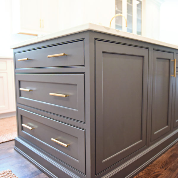 exquisite Atlanta kitchen renovation with custom white cabinets large island with seating and luxury appliances