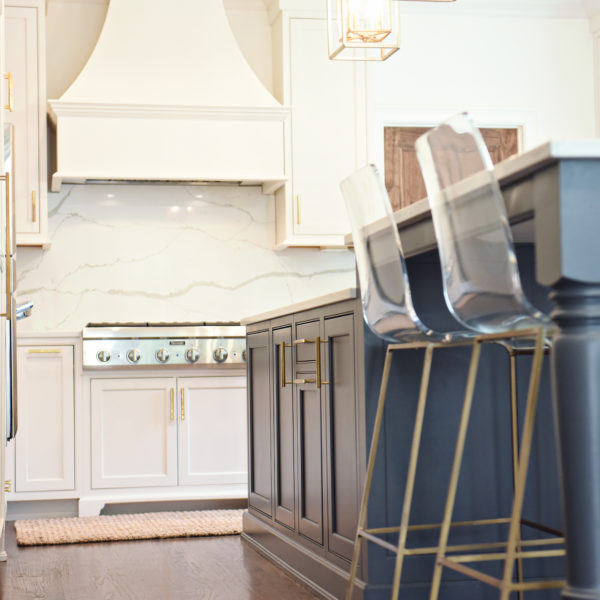 exquisite Atlanta kitchen renovation with custom white cabinets large island with seating and luxury appliances