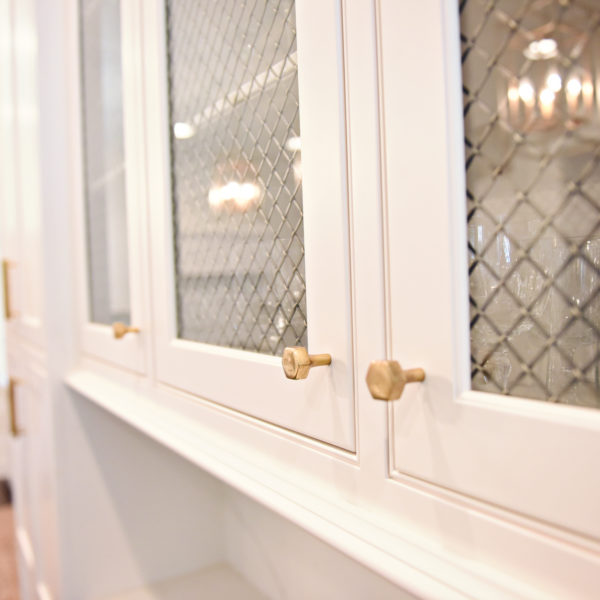 exquisite Atlanta kitchen renovation with custom white cabinets large island with seating and luxury appliances