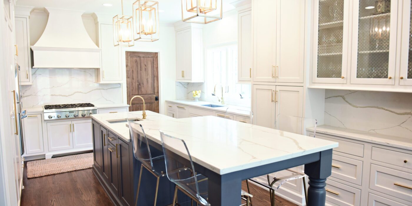 exquisite Atlanta kitchen renovation with custom white cabinets large island with seating and luxury appliances
