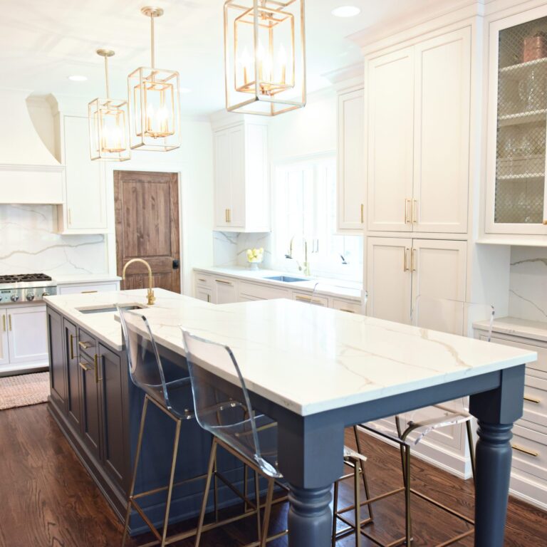 exquisite Atlanta kitchen renovation with custom white cabinets large island with seating and luxury appliances