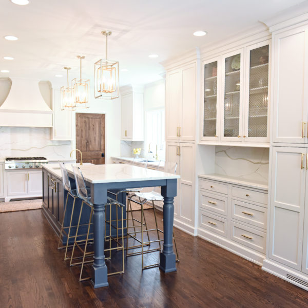 exquisite Atlanta kitchen renovation with custom white cabinets large island with seating and luxury appliances