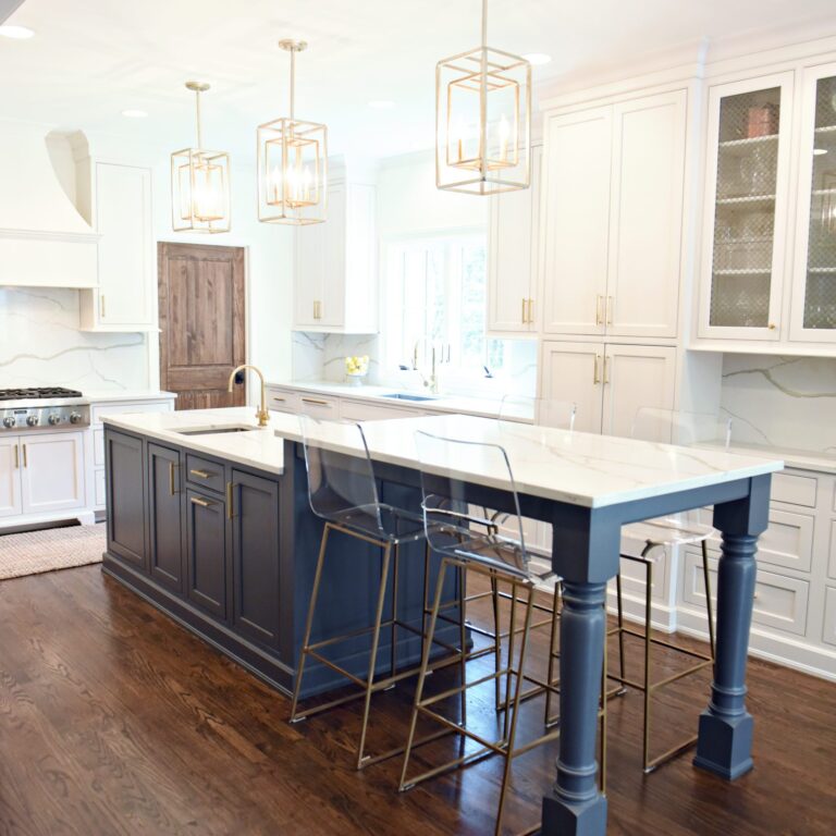exquisite Atlanta kitchen renovation with custom white cabinets large island with seating and luxury appliances