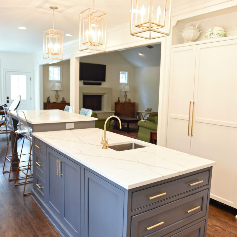 exquisite Atlanta kitchen renovation with custom white cabinets large island with seating and luxury appliances