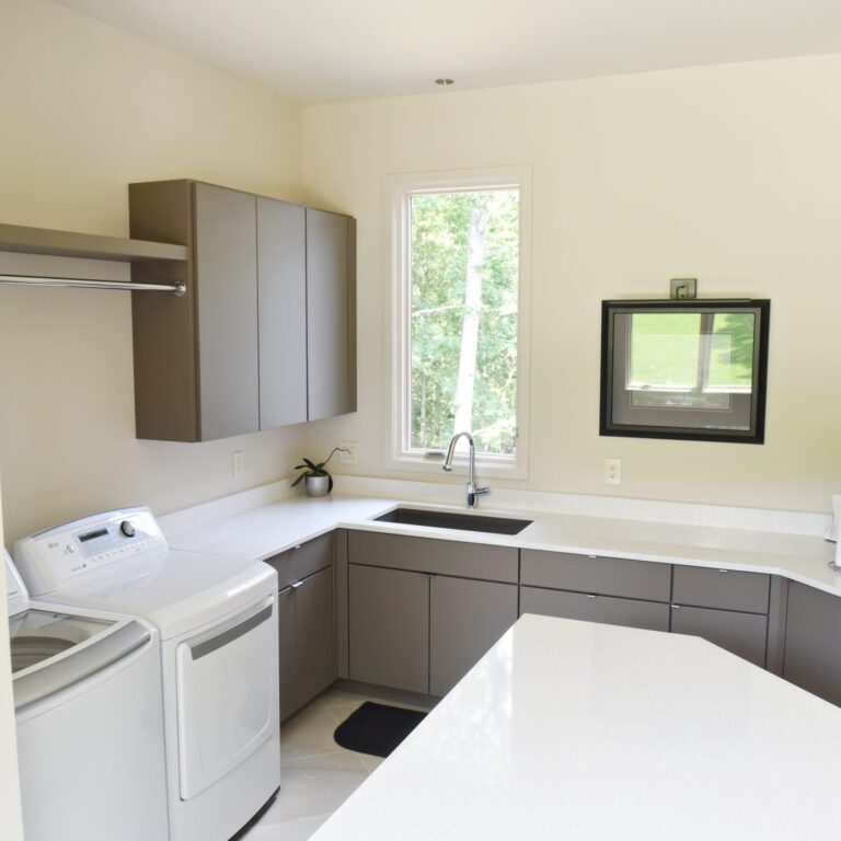 custom laundry room cabinets to maximize every inch of storage space