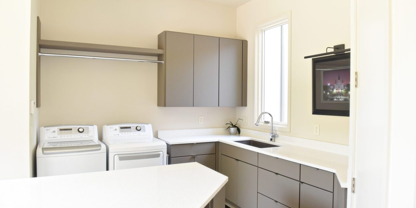 custom laundry room cabinets to maximize every inch of storage space
