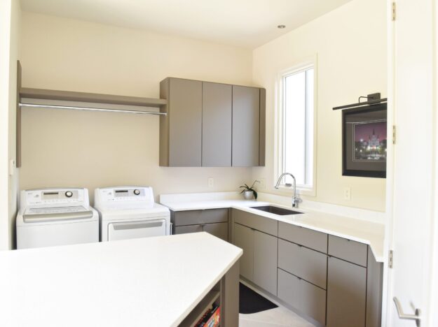 custom laundry room cabinets to maximize every inch of storage space