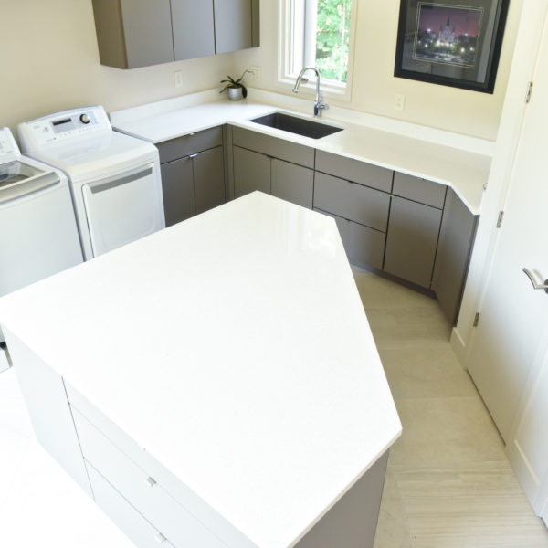 custom laundry room cabinets to maximize every inch of storage space
