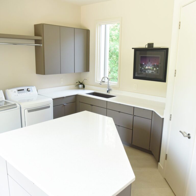 custom laundry room cabinets to maximize every inch of storage space