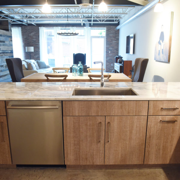 modern kitchen design in loft building with industrial ceiling