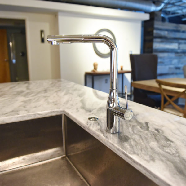 modern kitchen design in loft building with industrial ceiling