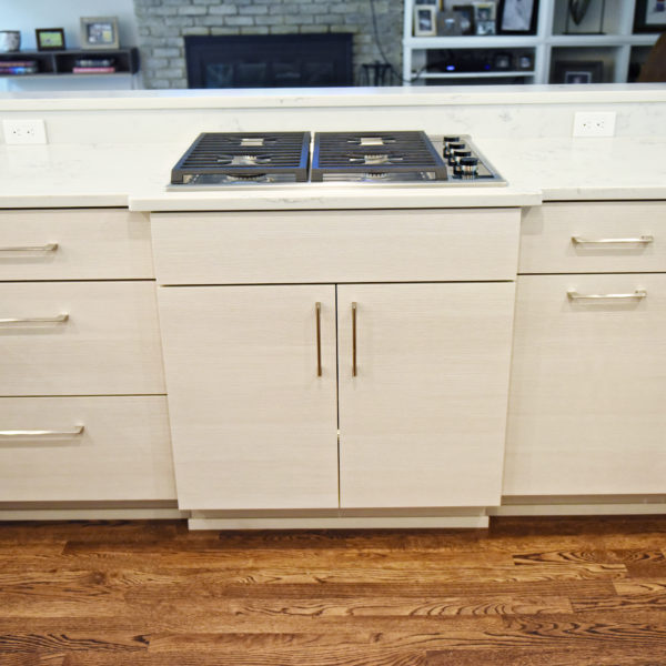 Atlanta area kitchen transformation with white cabinets luxury appliances breakfast nook and custom storage tower and pantry cabinets