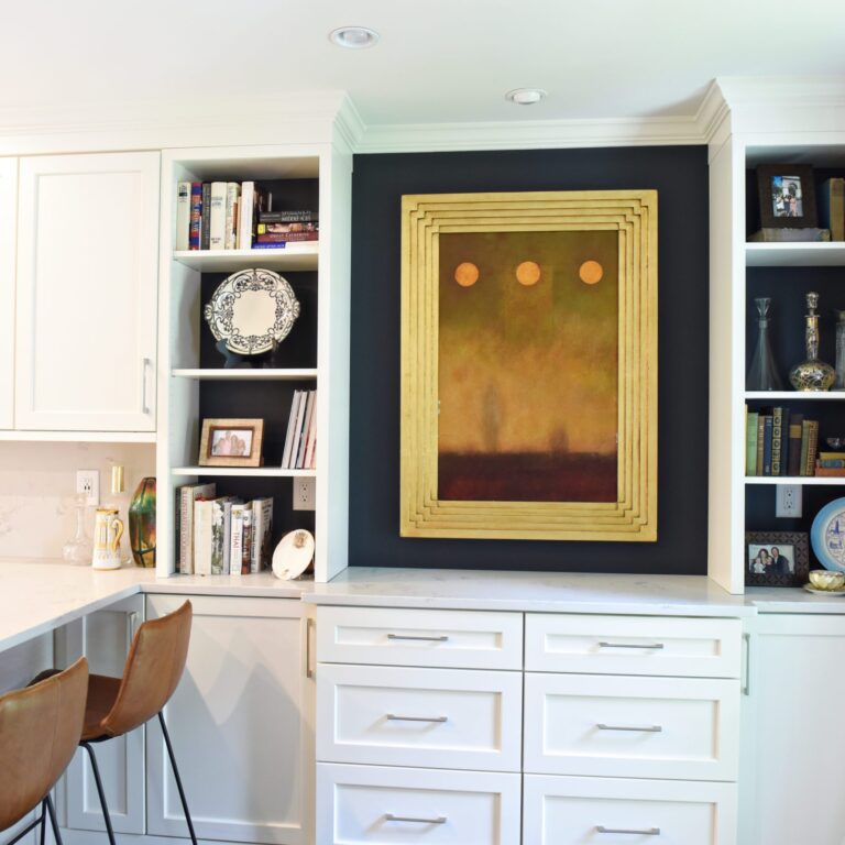 Atlanta area kitchen transformation with white cabinets luxury appliances breakfast nook and custom storage tower and pantry cabinets