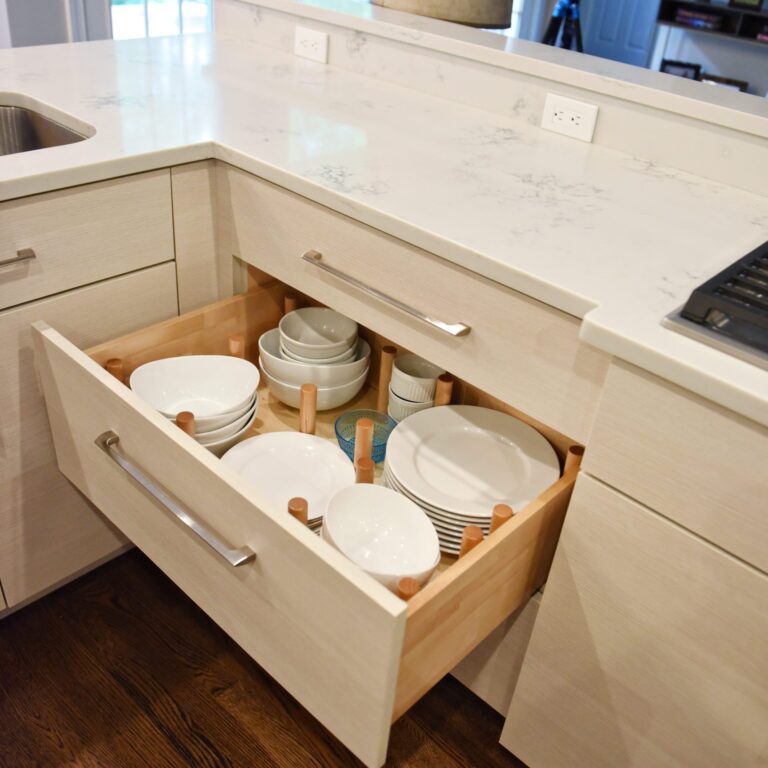 Atlanta area kitchen transformation with white cabinets luxury appliances breakfast nook and custom storage tower and pantry cabinets