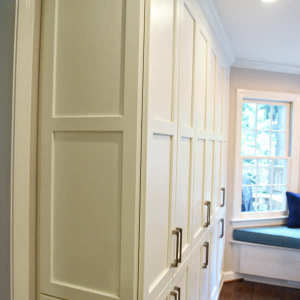 Atlanta area kitchen transformation with white cabinets luxury appliances breakfast nook and custom storage tower and pantry cabinets