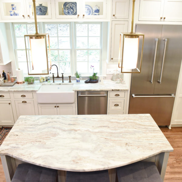 transitional Atlanta kitchen with white cabinets grey island luxury stainless steel appliances farmhouse sink