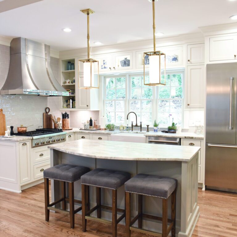 transitional Atlanta kitchen with white cabinets grey island luxury stainless steel appliances farmhouse sink