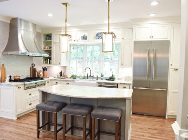 transitional Atlanta kitchen with white cabinets grey island luxury stainless steel appliances farmhouse sink