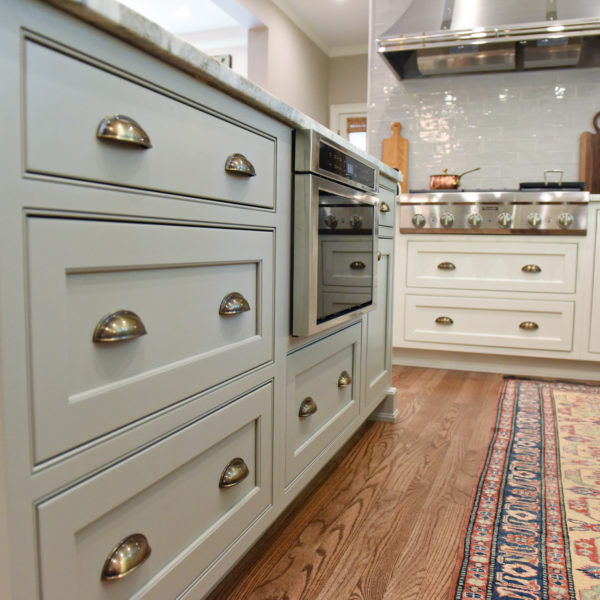 transitional Atlanta kitchen with white cabinets grey island luxury stainless steel appliances farmhouse sink