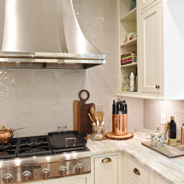 transitional Atlanta kitchen with white cabinets grey island luxury stainless steel appliances farmhouse sink