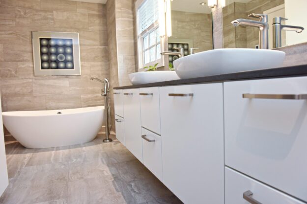 modern Atlanta bathroom with walk in shower soaking tub two vessel sinks on a large vanity