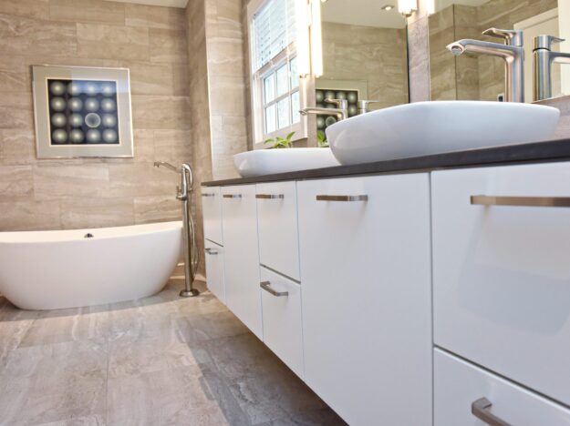 modern Atlanta bathroom with walk in shower soaking tub two vessel sinks on a large vanity