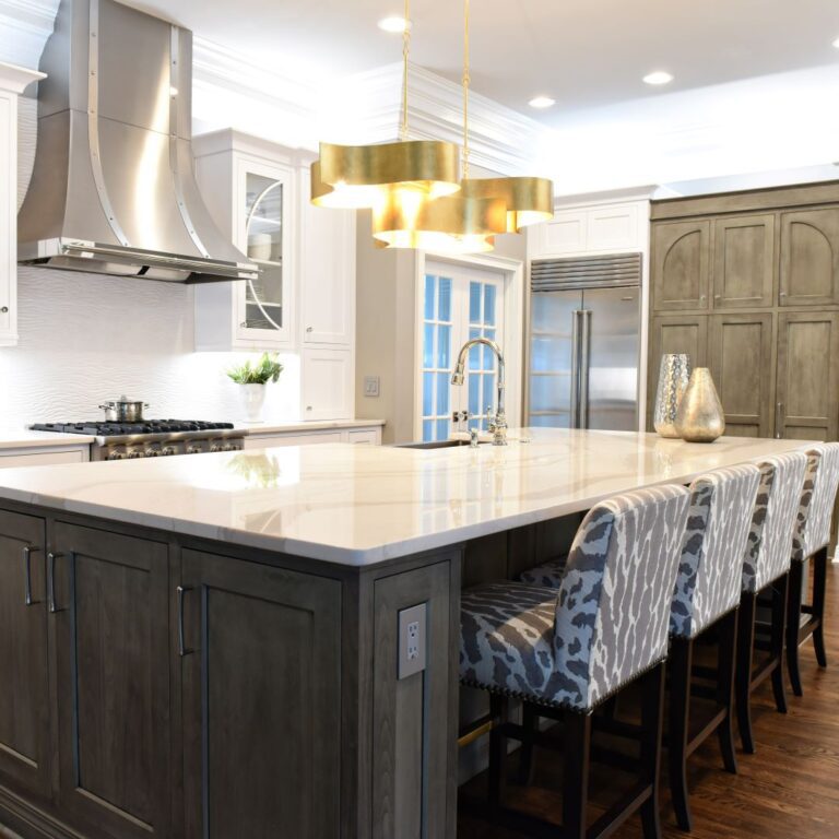 kitchen renovation Johns Creek GA with stainless steel appliances white cabinets grey island marble countertops