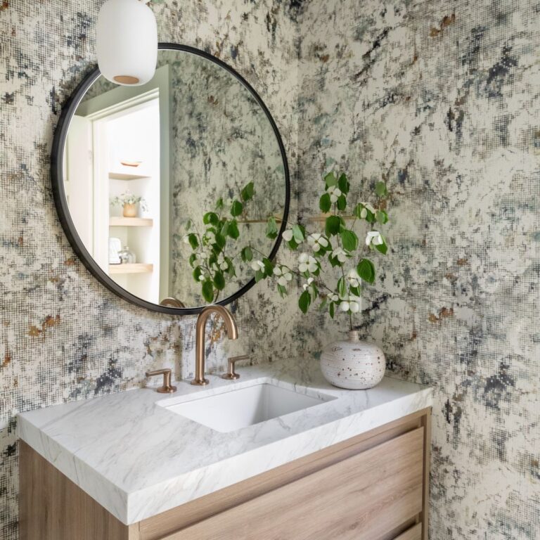 picture of floating vanity in bathroom with wallpaper on walls