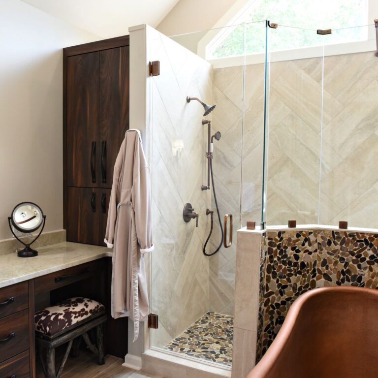 rustic roswell bathroom renovation with copper soaking tub double sided walk-in shower and custom storage cabinets