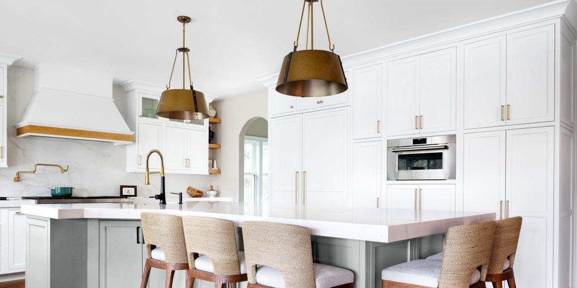 picture of seating area around kitchen island in a beautifully renovated kitchen in a Marietta, GA home featuring custom cabinets by Schuon Kitchens & Baths