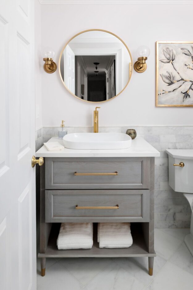 picture of an elegant powder room renovation in a lovely Marietta, GA home featuring custom cabinets by Schuon Kitchens & Baths from Roswell GA