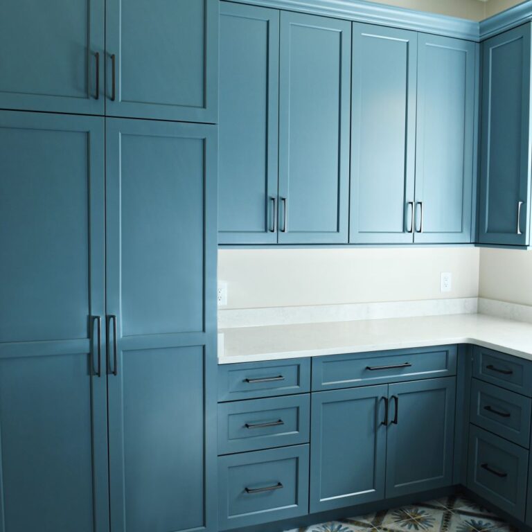 picture of blue cabinets in an Atlanta laundry room that was renovated