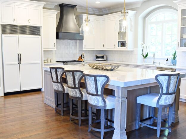 this kitchen remodel features a large island and luxury appliances in marietta ga