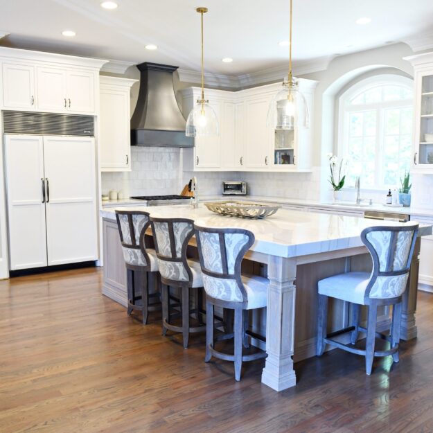 this kitchen remodel features a large island and luxury appliances in marietta ga