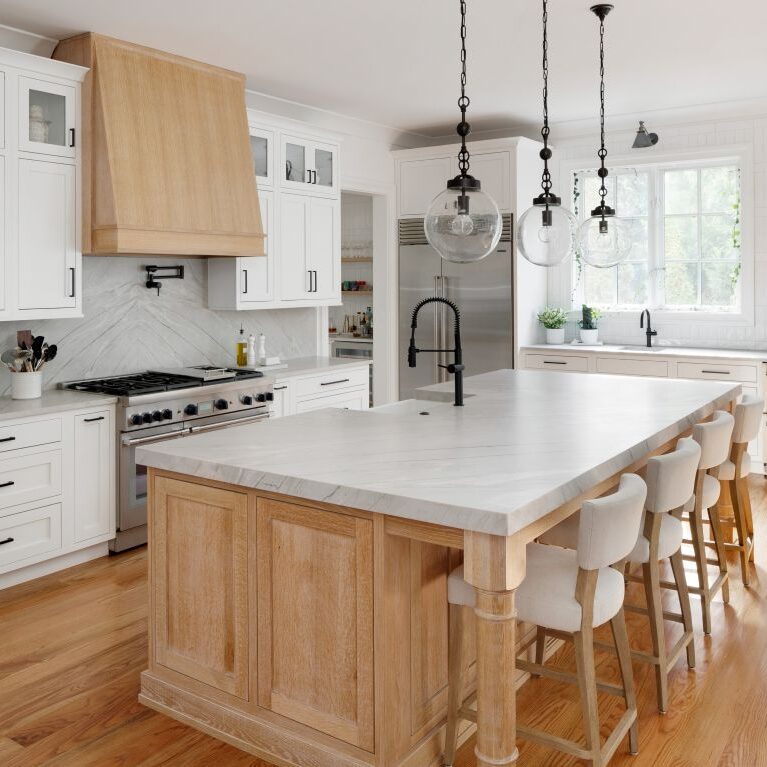beautiful buckhead kitchen remodel featuring white cabinets and a natural color wood island