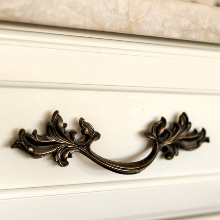 close up of antique hardware kitchen drawer pull with leaf design in a Sandy Springs renovation