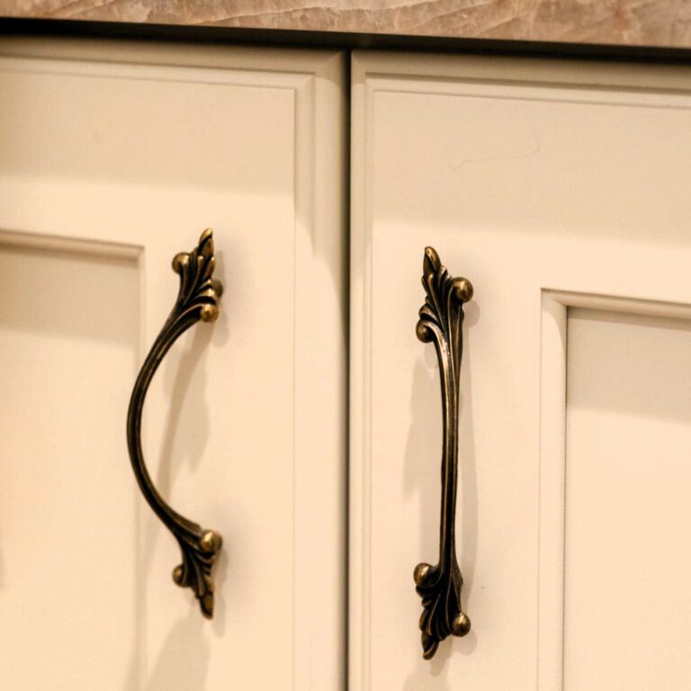 close up of vintage hardware in a leaf shape used in a luxury Sandy Springs renovation