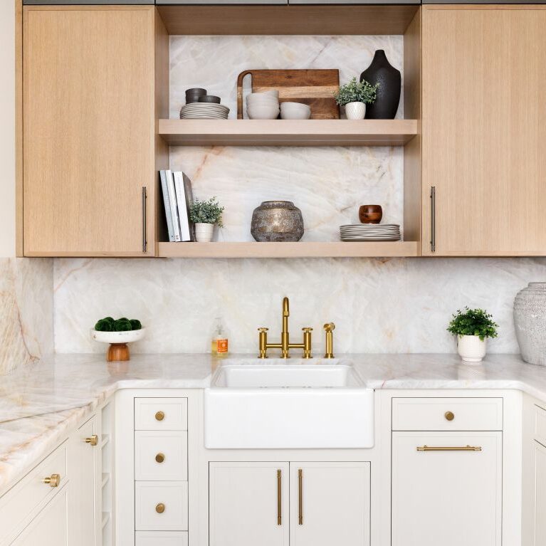 . This stunning kitchen showcases the perfect balance of modern innovation and timeless style, highlighting the latest products and design trends in luxury living.