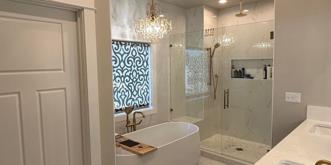 exquisite bathroom renovation in Smyrna, GA featuring soaking tub, walk-in shower, double bowl vanity with quartz top