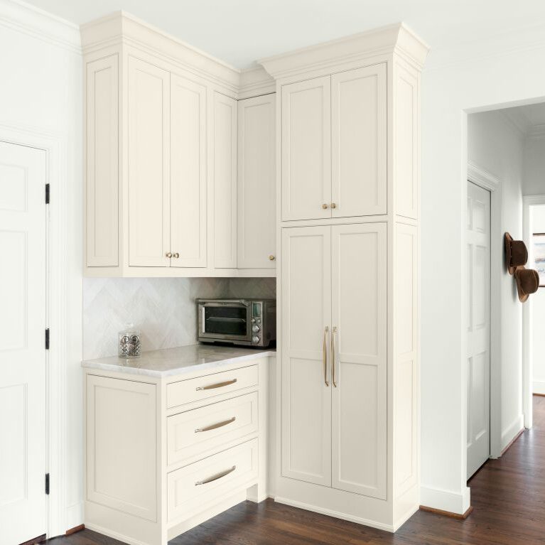 the Breville oven gets its own space in this luxury Vinings kitchen remodel with additional cabinets for storage